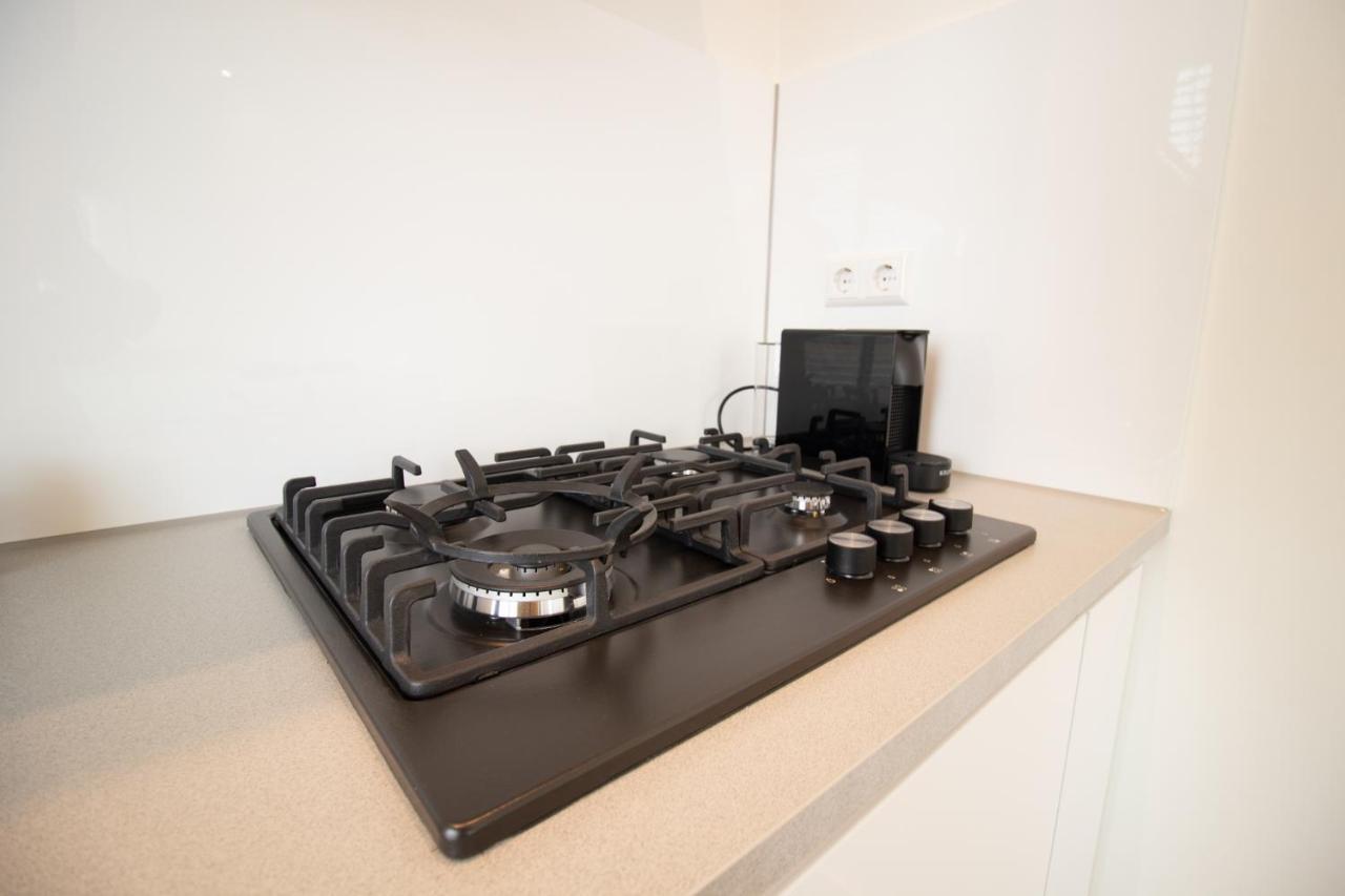 Escamp Apartments Хага Екстериор снимка