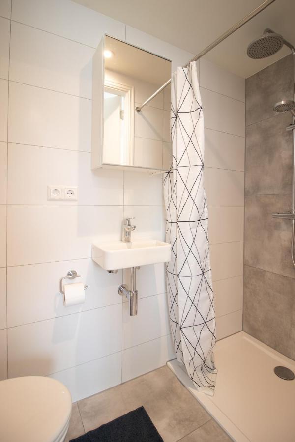 Escamp Apartments Хага Екстериор снимка