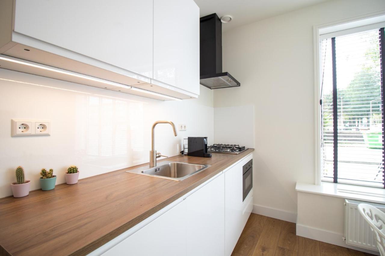 Escamp Apartments Хага Екстериор снимка