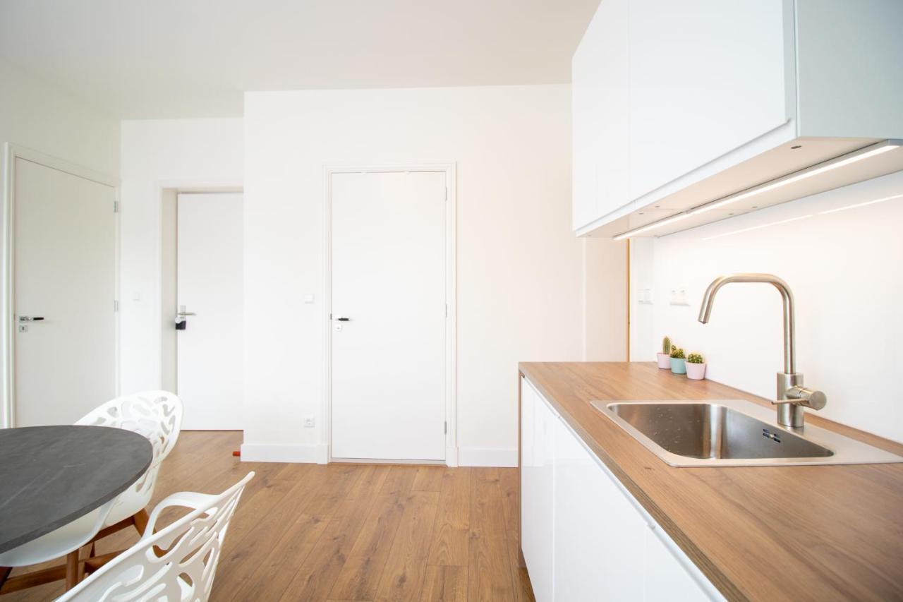 Escamp Apartments Хага Екстериор снимка